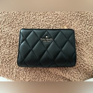 Never used with tag Kate spade wallet black with gold interior